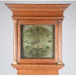 A mid-18th century oak longcase clock, the thirty hour movement striking on a bell via an outside