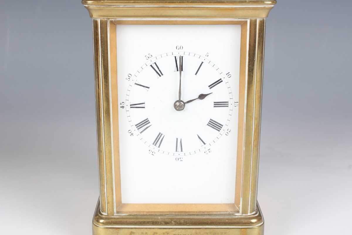 A late 19th century French brass corniche cased carriage clock with eight day movement striking on a - Image 2 of 8