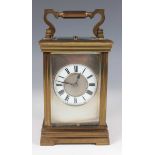 A late 19th century French brass cased carriage clock by Maurice & Co, with eight day movement
