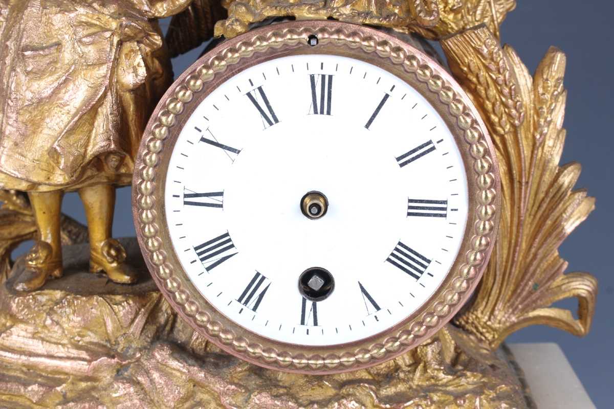 An early 20th century oak mantel clock with eight day movement striking on a gong, the white - Image 8 of 27