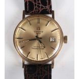 A Tissot Seastar Seven Automatic gold cased gentleman’s wristwatch, the signed gilt dial with