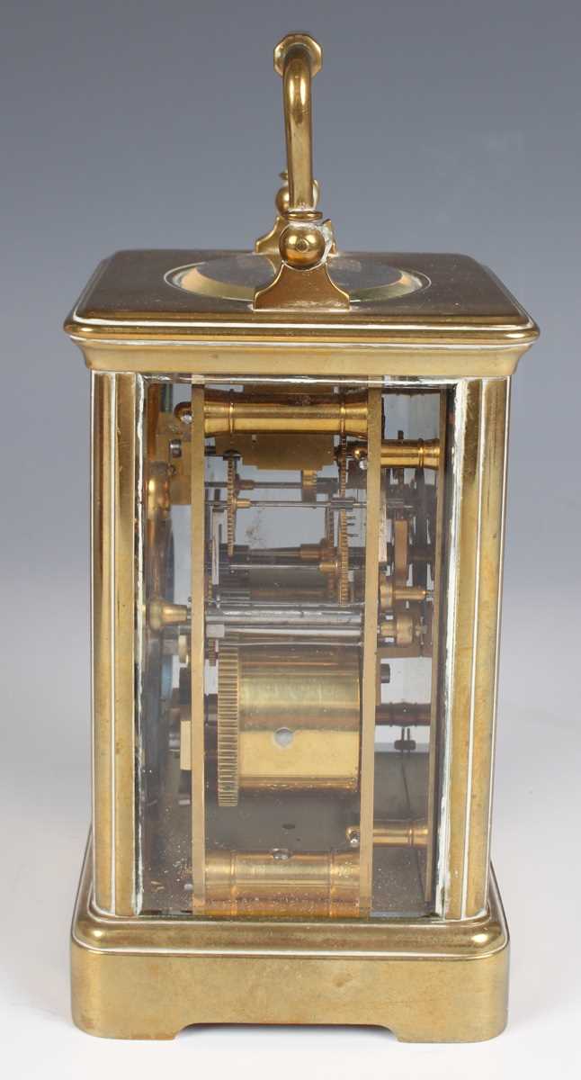 A late 19th century French brass corniche cased carriage clock with eight day movement striking on a - Image 6 of 8