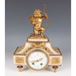 A late 19th century French ormolu and white marble mantel clock, the eight day movement with