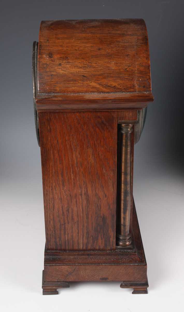 An early 20th century oak mantel clock with eight day movement striking on a gong, the white - Image 6 of 27