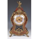 A late 19th century French gilt metal mounted and red tortoiseshell boulle cased bracket clock and
