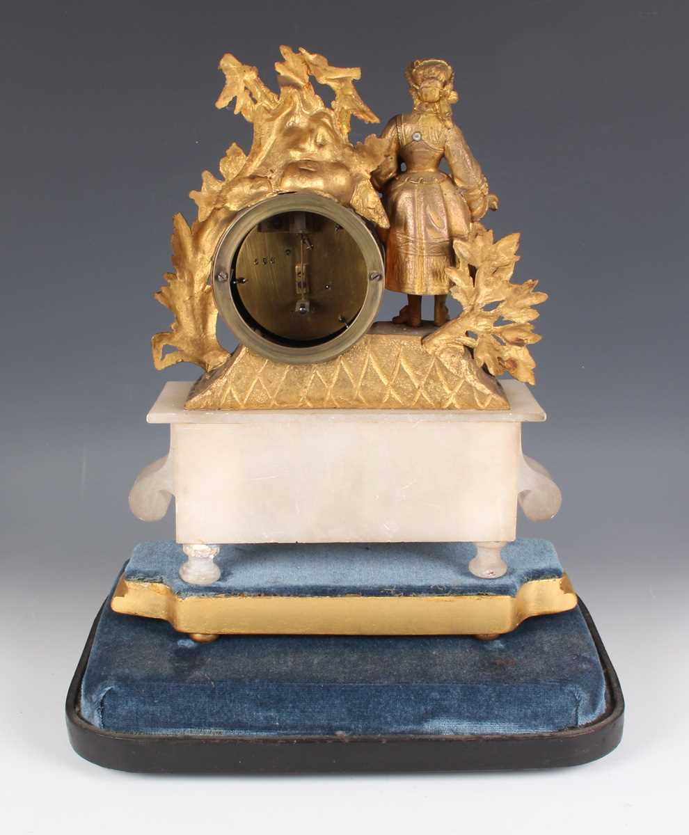 An early 20th century oak mantel clock with eight day movement striking on a gong, the white - Image 11 of 27