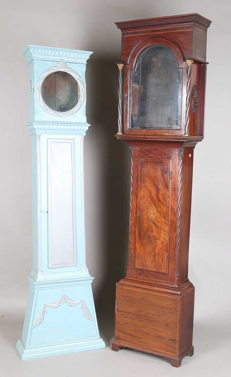 A George III mahogany longcase clock case, the hood with moulded pediment above glazed door and