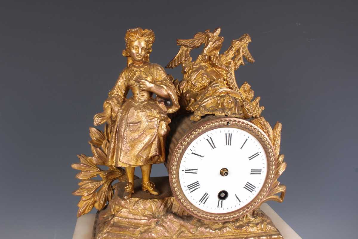 An early 20th century oak mantel clock with eight day movement striking on a gong, the white - Image 9 of 27