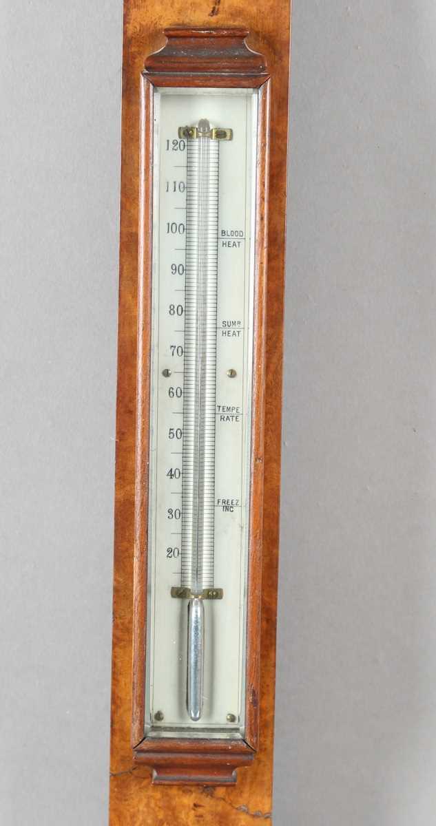 A late Victorian walnut stick barometer, the arched ivorine dial with Vernier scale and inscribed 'A - Image 2 of 4