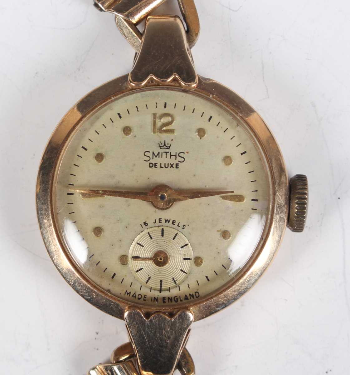 A 9ct gold circular cased lady's wristwatch, the enamelled dial with Arabic numerals, on a sprung - Image 2 of 10