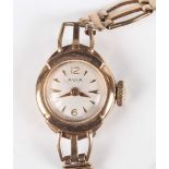 An Avia 9ct gold lady’s bracelet wristwatch, the signed circular silvered dial with gilt Arabic