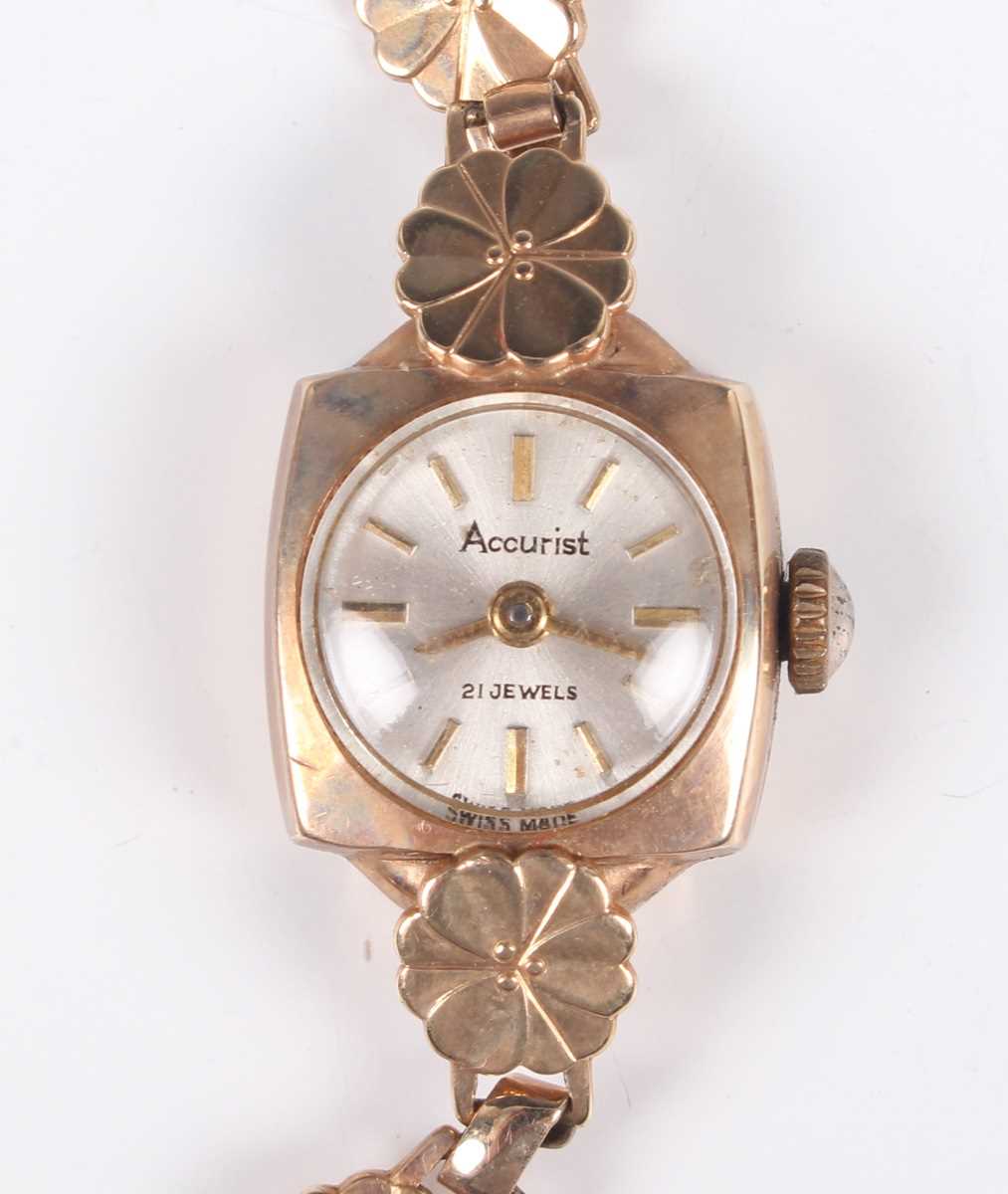 An Accurist 9ct gold cased lady’s bracelet wristwatch, the signed circular silvered dial with gilt