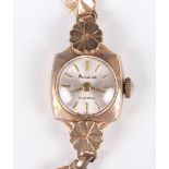 An Accurist 9ct gold cased lady’s bracelet wristwatch, the signed circular silvered dial with gilt