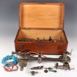 A Wolf Jahn & Co Germany watchmaker's lathe and accessories, boxed, length 33.2cm.