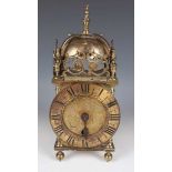 A mid-17th century style brass lantern timepiece with Coventry Astral movement, the chapter ring