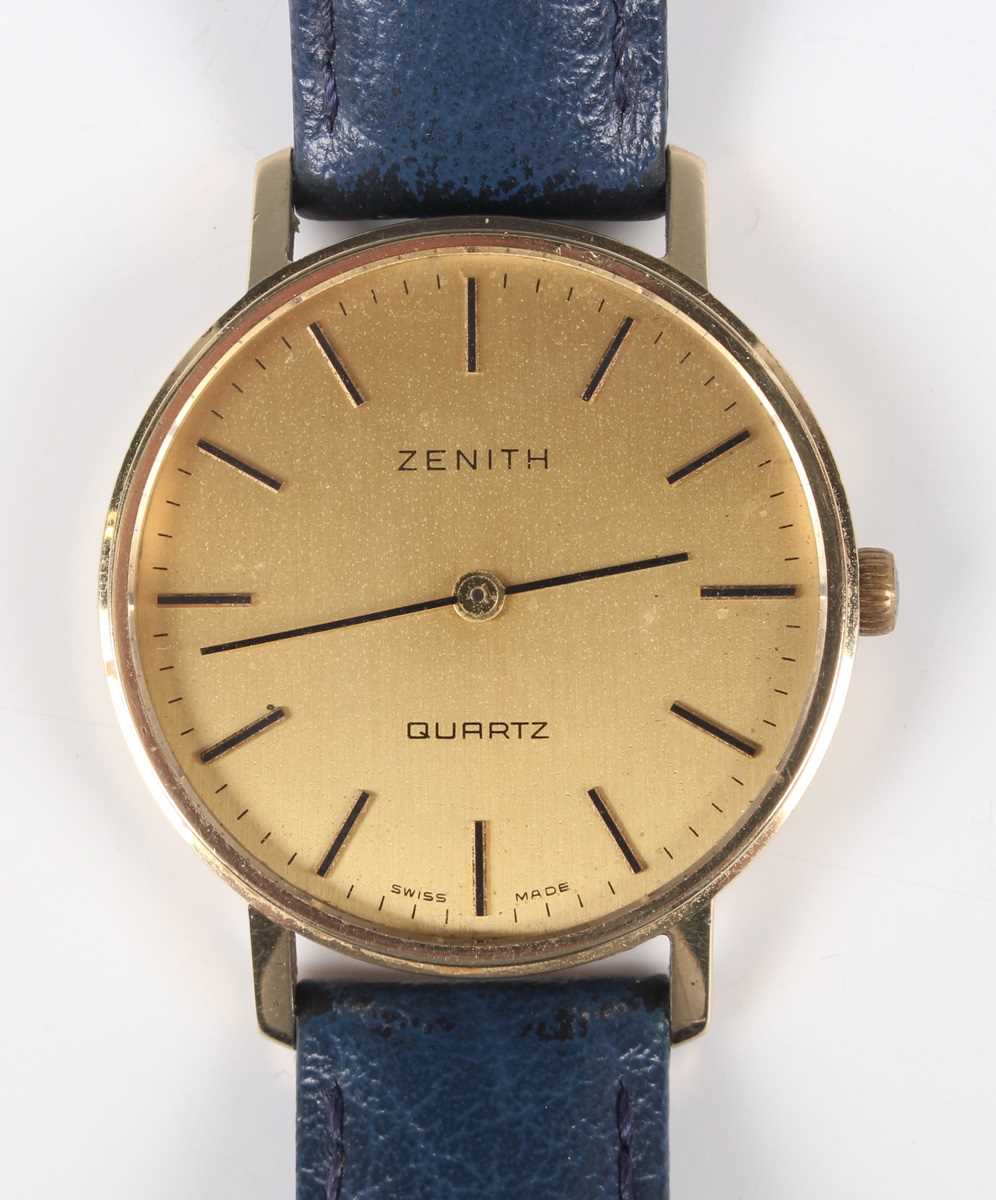 A Zenith Quartz 9ct gold circular cased gentleman’s wristwatch, the signed gilt dial with baton hour