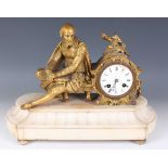 A late 19th century gilt spelter and alabaster mantel clock with eight day movement striking on a