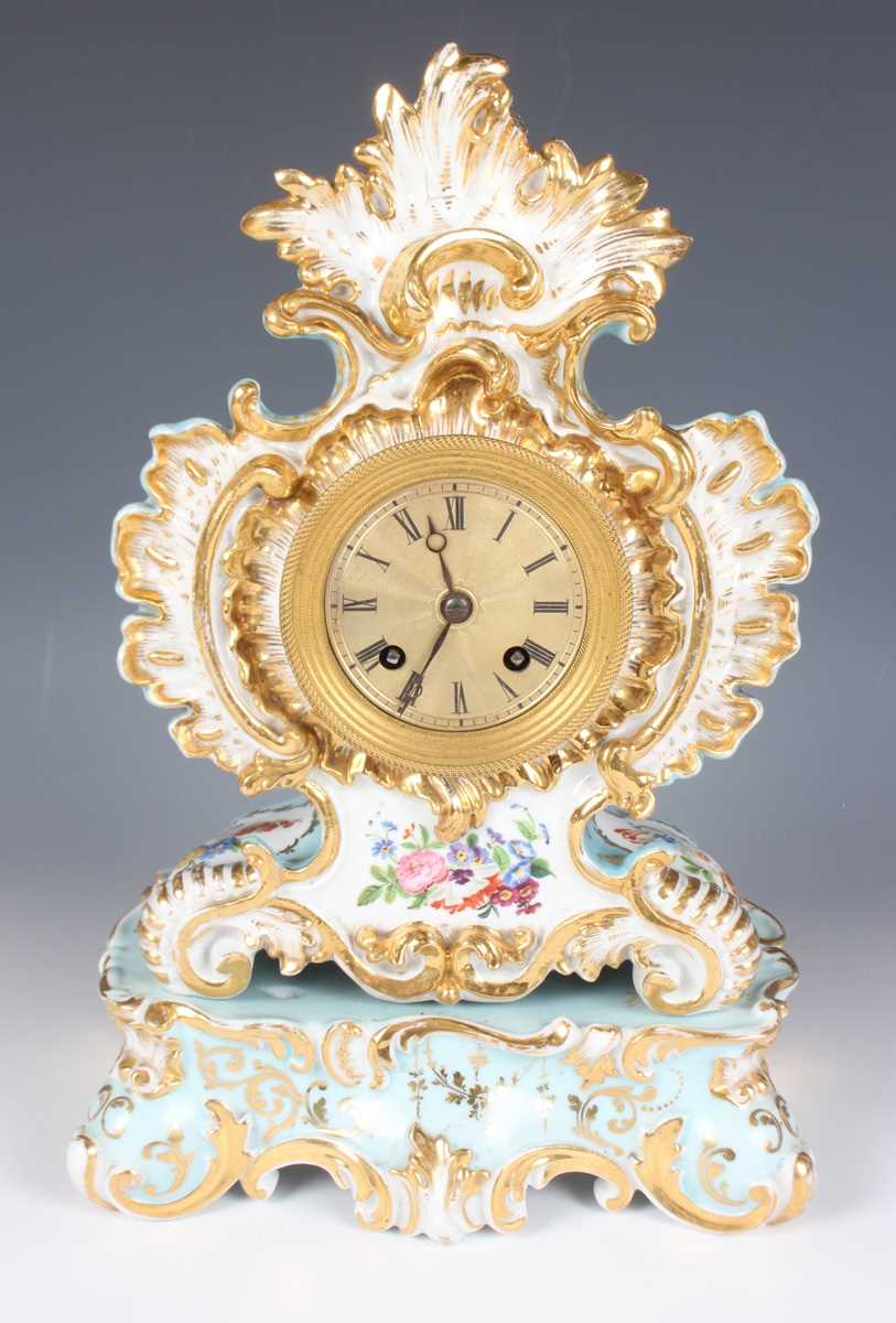 A mid-19th century French Jacob Petit Paris porcelain cased mantel clock and matching stand, the