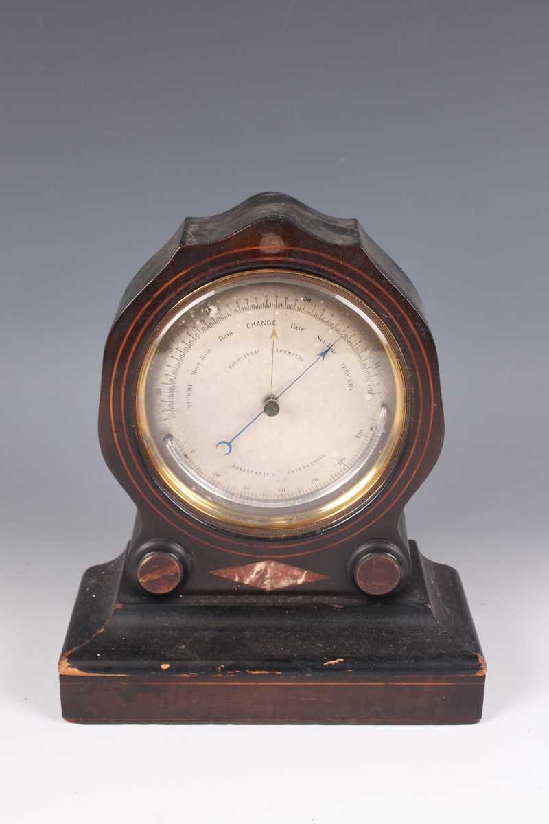 An early 20th century oak mantel clock with eight day movement striking on a gong, the white - Image 18 of 27