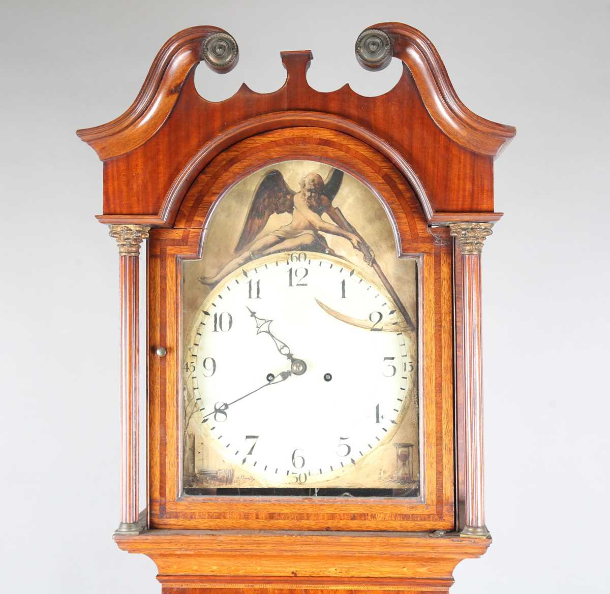 A George III oak and mahogany longcase clock with eight day movement striking on a bell, the 13-inch