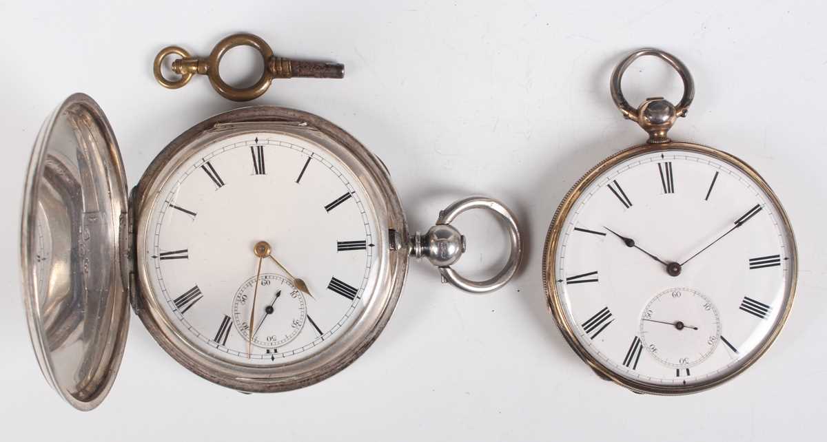 A late Victorian silver hunting cased keywind gentleman's pocket watch, the gilt three-quarter plate