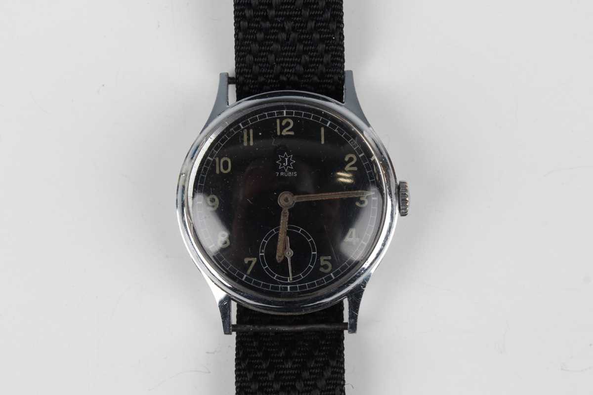 A Junghans military style chrome plated and steel backed circular cased gentleman's wristwatch,