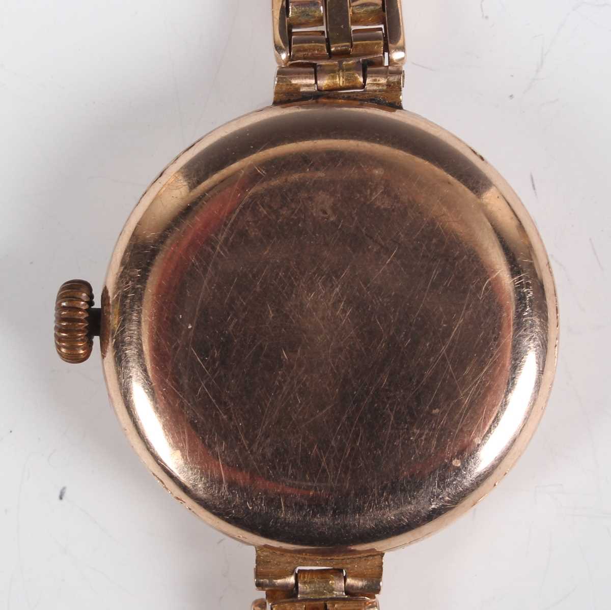 A 9ct gold circular cased lady's wristwatch, the enamelled dial with Arabic numerals, on a sprung - Image 8 of 10