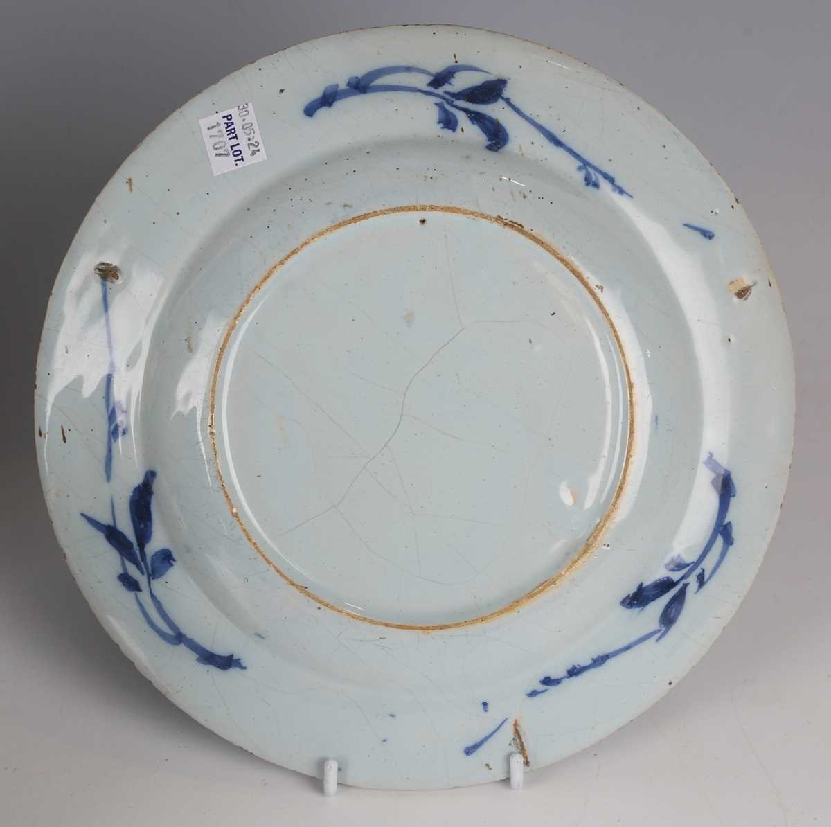 A matched pair of English delft plates, probably London, 1780s, painted in blue with a chinoiserie - Image 3 of 7