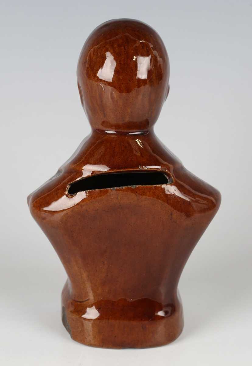 A brown glazed pottery money box, 19th century, modelled as a half-length titled bust of Robert - Image 3 of 5