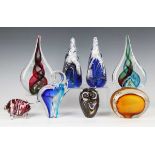 Four Polish studio glass paperweights by Adam Jablonski, early 20th century, the first two of
