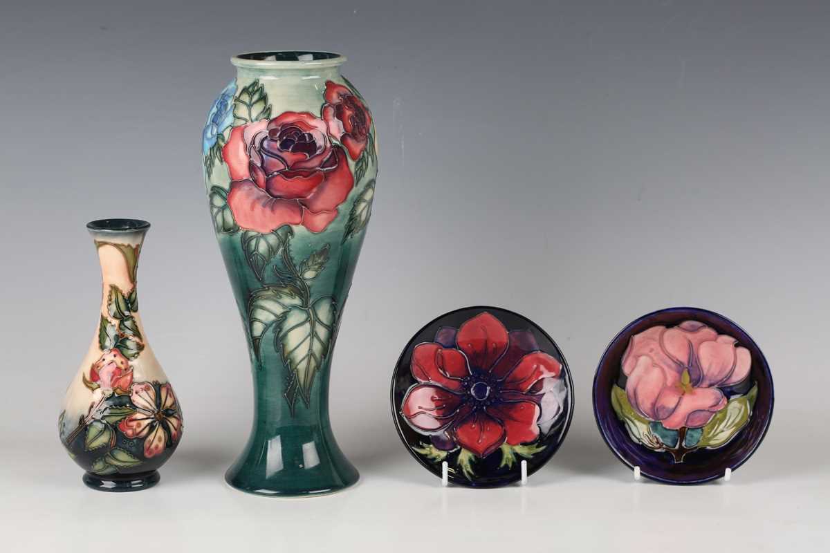 A Moorcroft limited edition Rose & Bud pattern vase, dated 1993, designed by Sally Tuffin, No. 115