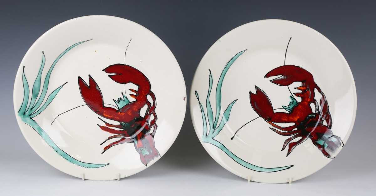 Two large Poole Pottery circular dishes, painted with lobsters, late 20th century, moulded marks