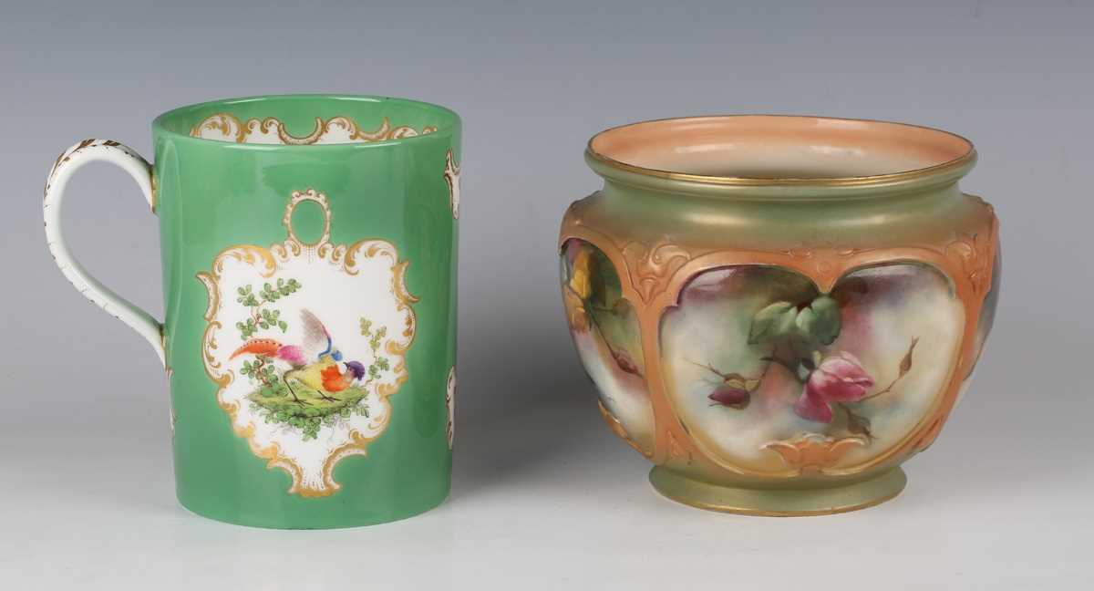 A Hadley Royal Worcester jardinière, dated 1903, painted with roses within relief borders against