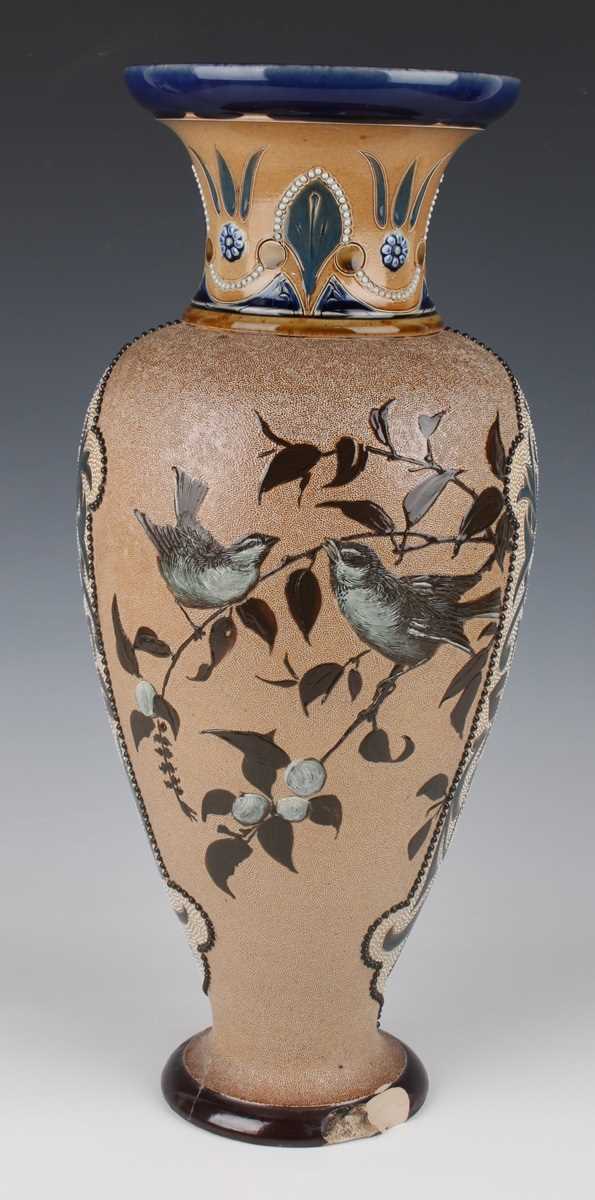 A large Doulton Lambeth stoneware vase, dated 1883, decorated by Florence Barlow, monogrammed,