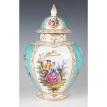 A Dresden porcelain vase and cover, 20th century, painted with figural and foliate panels against