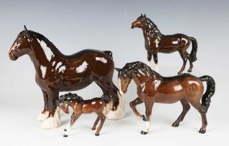 Four brown gloss Beswick horses, comprising third version Stocky Jogging Mare, No. 855, Shire