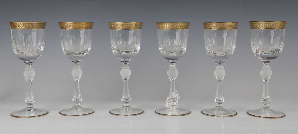 A set of six Continental gilt and cut glass wines, probably French or Bohemian, 20th century, the