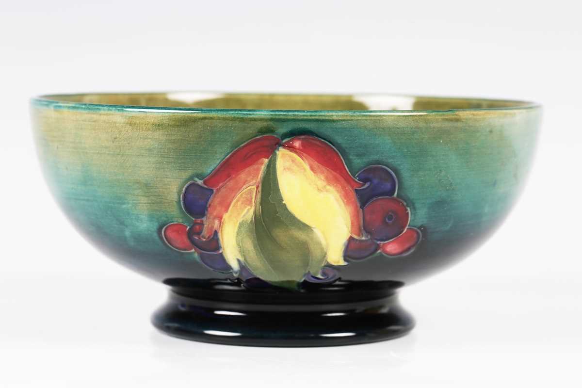 A Moorcroft Leaf and Berry pattern circular bowl, circa 1940, with shaded blue to green ground, - Image 4 of 7