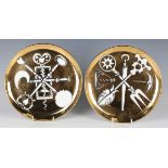 A pair of Fornasetti Posateria series gilt ground plates, dated 1956, numbered 1 and 6, black