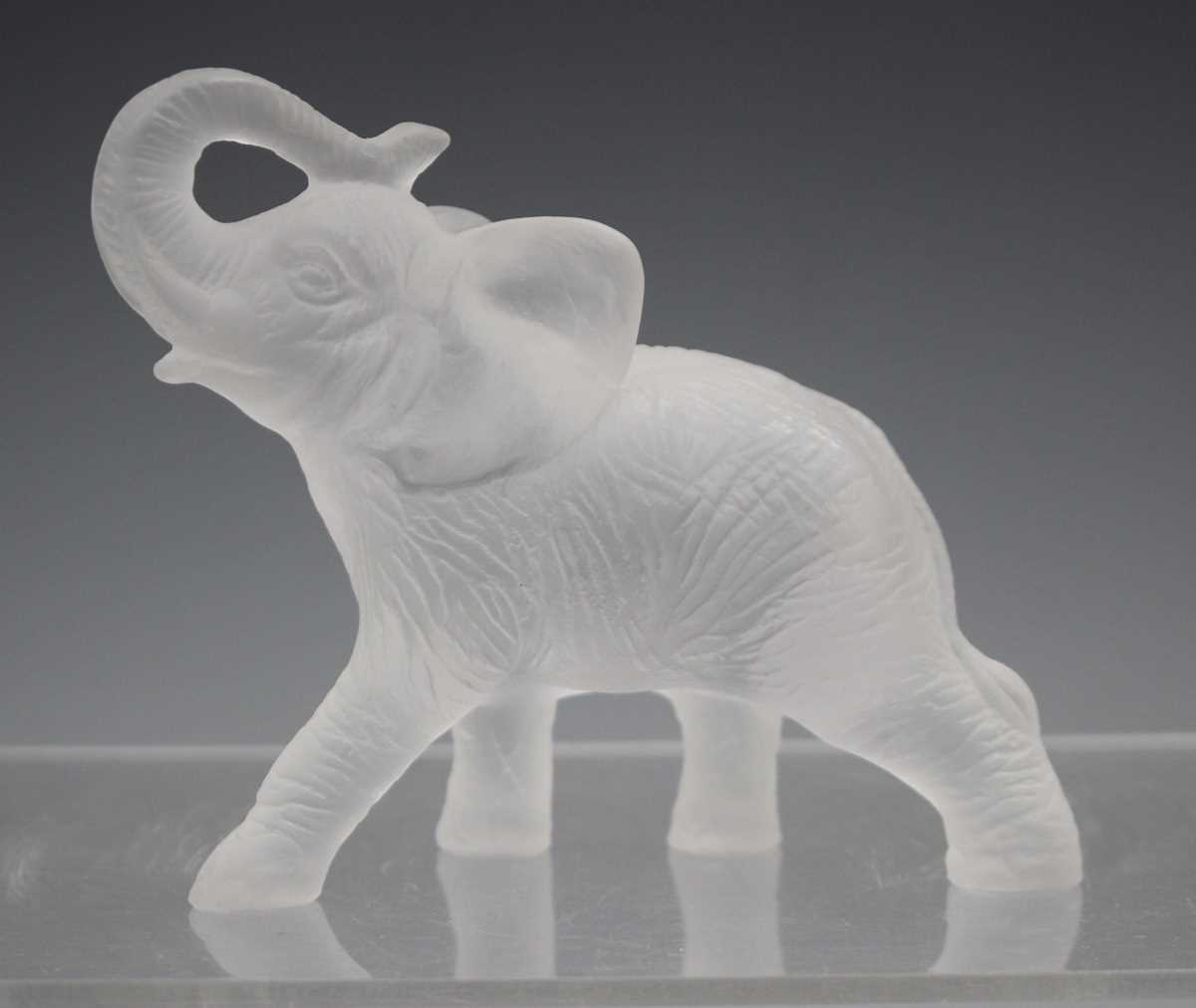 A Daum frosted amber glass model of an elephant with raised trunk, contemporary, designed by Jean- - Image 5 of 7