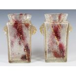 A pair of pale amber tinted crackle or ice glass vases, probably French, early 20th century, of