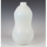 A large Murano battuto glass vase, in the manner of Carlo Scarpa, the milky white body of gourd