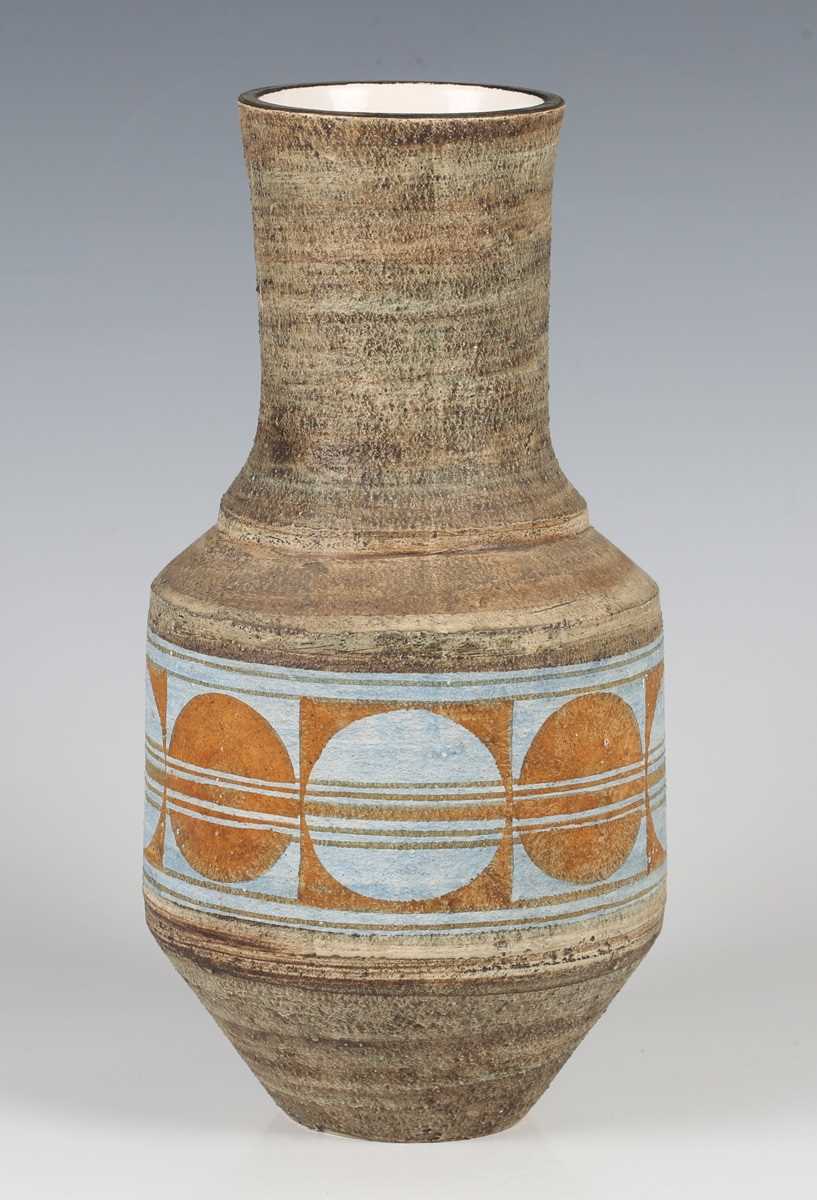 A Newlyn Troika pottery urn vase, 1973-79, decorated by Avril Bennett, monogrammed, with a pale blue