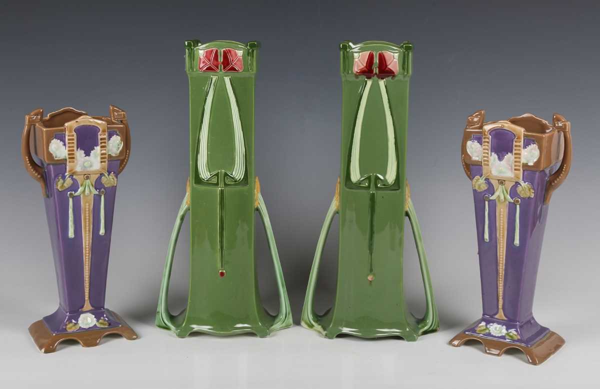 A pair of Secessionist Eichwald majolica vases, early 20th century, of square section flanked by