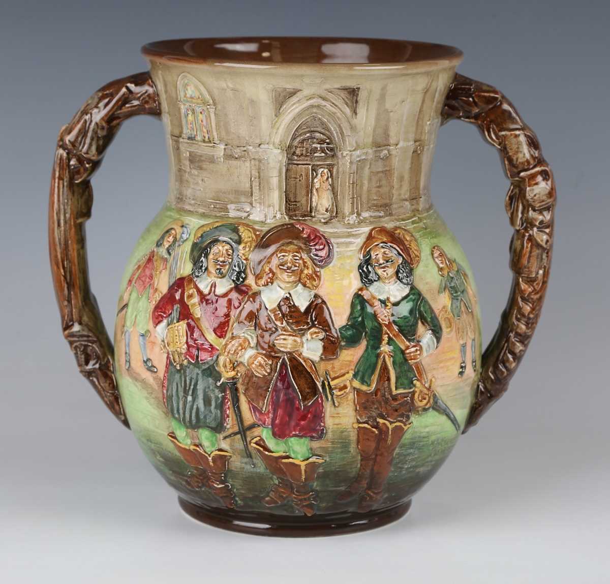 A Royal Doulton limited edition The Three Musketeers two-handled loving cup, No. 79 of 600, black