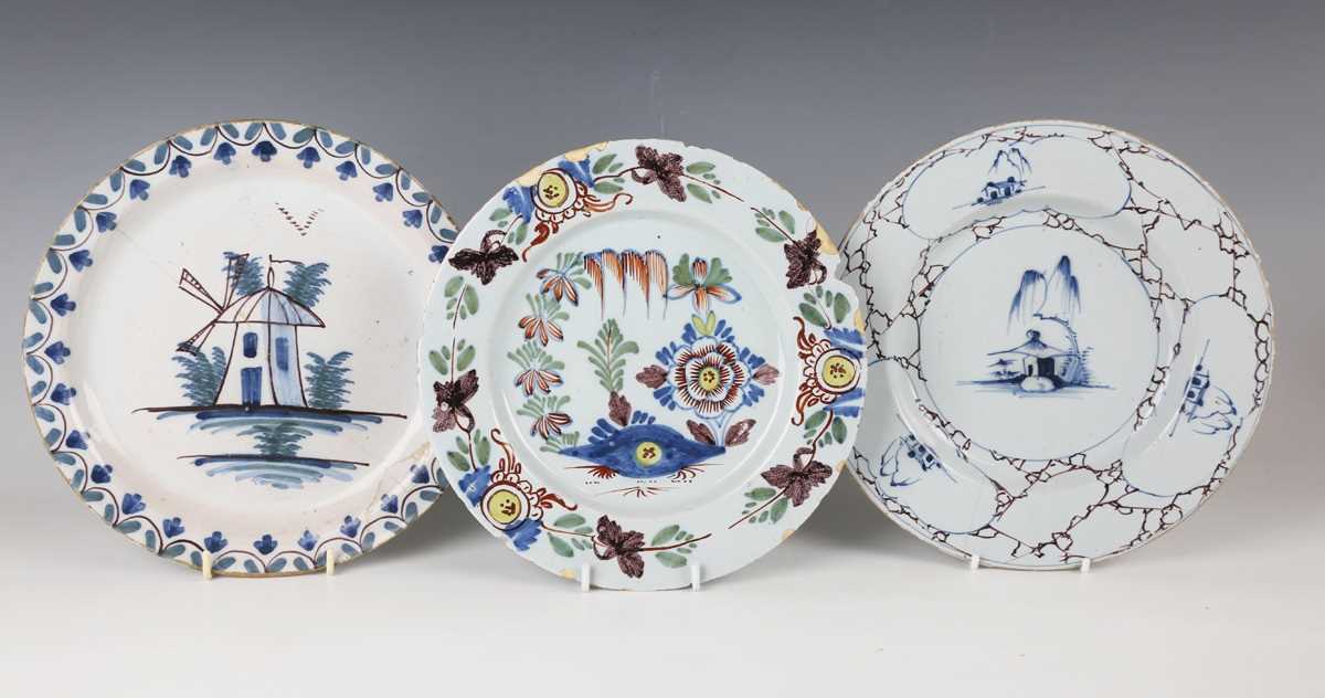 An English delft plate, Lambeth, circa 1770-85, painted in blue, green and manganese with a windmill