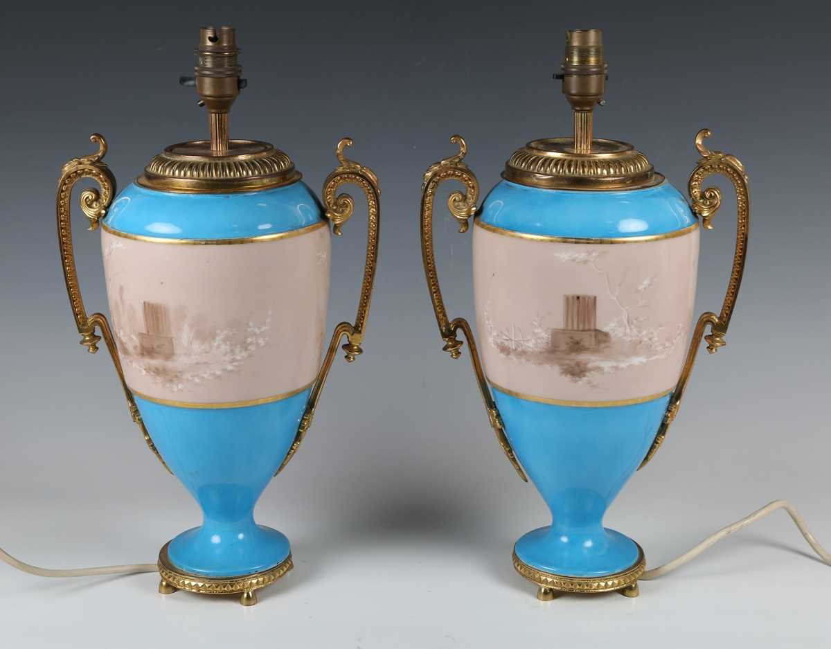 A pair of Sèvres style ormolu mounted porcelain lampbases, circa 1900, both painted with a sepia - Image 2 of 8