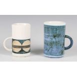 A St. Ives Troika pottery mug, circa 1964-70, blue glazed with a band of vertical lines to the rim