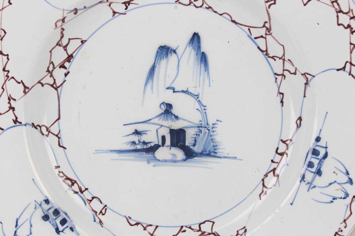 An English delft plate, Lambeth, circa 1770-85, painted in blue, green and manganese with a windmill - Image 16 of 23