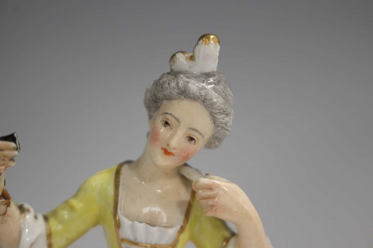 A pair of Paris porcelain Commedia dell'Arte style figures, early 20th century, he wearing a black - Image 3 of 12